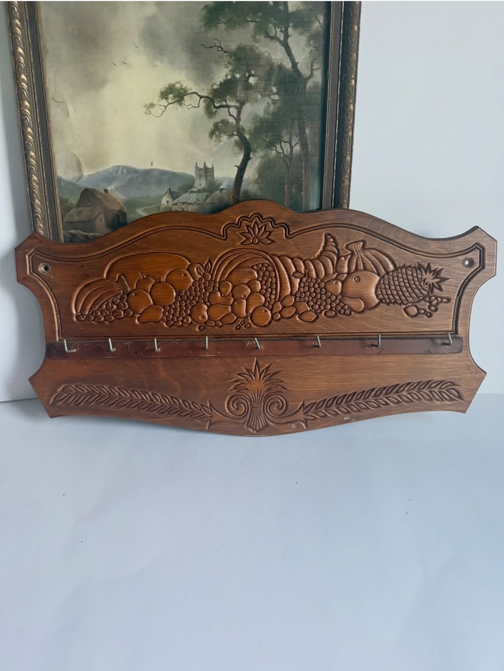 Hand-Carved Fruit Motif Wooden Wall Rack in Brown